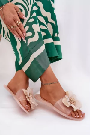 Caurspīdīgas plakanas sieviešu čības ar mākslīgo ziedu Nude Vobetta